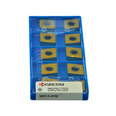 Packaging of Kyocera cutting tool inserts with blue and yellow design.
